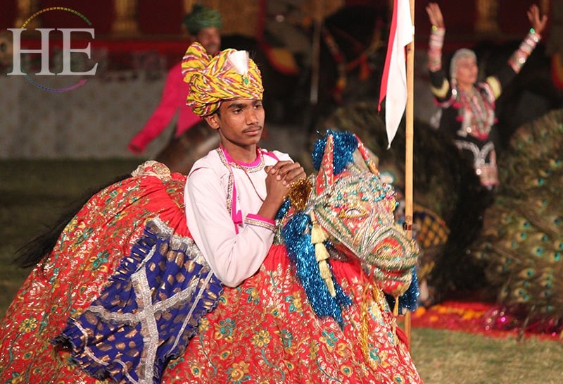 A man wearing a decorative horse costume on HE Travel's gay India Adventure tour