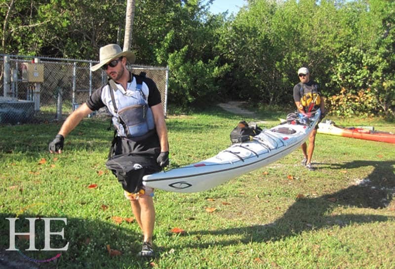 Zach and Daisson carry the kayak Key Largo
