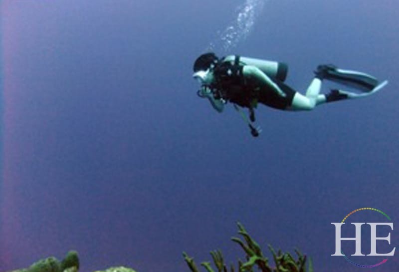 a diver in saba on the HE Travel gay scuba trip