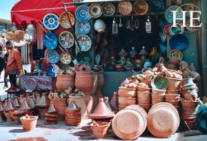 intricately painted pottery and cookware on display on HE Travel gay Morocco cultural tour