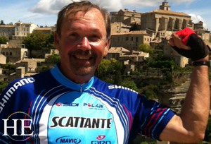 proud bicyclist at les baux on HE Travel Provencal gay biking trip in the French countryside