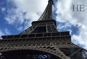A picture of the Eiffel tower, one of the monuments HE Travel can take you around the world