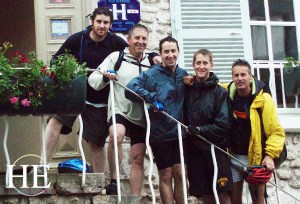 group of bikers on the stairs on the HE Travel gay cycling tour in France