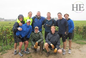 group of men at a vineyard on the HE Travel gay biking tour of Burgundy in France