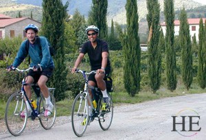 cyclists on the road on the HE Travel gay biking tour in Tuscany Italy