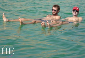 friends floating in the dead sea on the HE Travel gay israel Adventure tour