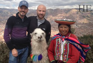 Cute couple with Peruvian lady and her llama on HE Travel gay hiking tour to Machu Picchu