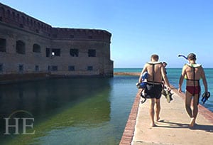 two gentlemen gear up to go snorkeling in the beautiful dry tortugas off of key west in the florida keys
