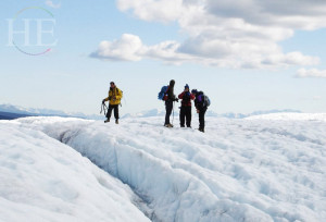 hikers atop the glacier on the HE Travel gay alaska adventure