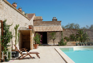A poolside view at the Puglia Villa on HE Travel's Puglia Villa Culinary Experience.