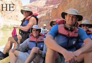 resting on the boat in the shade on the HE Travel gay adventure Grand Canyon
