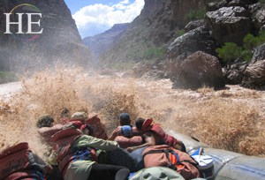 ride a wild whitewater raft on the HE Travel gay adventure Grand Canyon