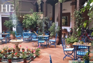 lush courtyard and fountain on the HE Travel gay biking tour of Spain