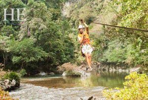 zipline over the river on the HE Travel gay adventure in colombia