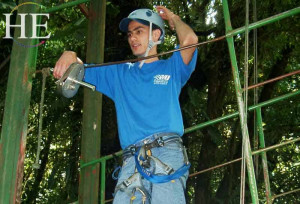 cute guy goes ziplining on the HE Travel gay paradise adventure tour in Costa Rica