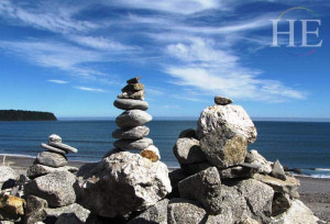 rock cairns on the HE Travel gay New Zealand adventure