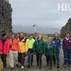 a gay group in rainbow jackets on a gay adventure in Iceland
