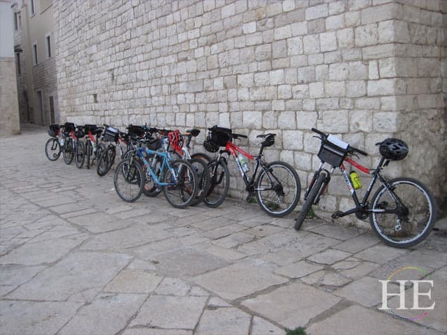bikes lined up at church on the HE Travel gay bike tour in puglia italy