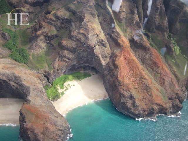 view from helicopter over na pali coast kauai hawaii with HE Travel