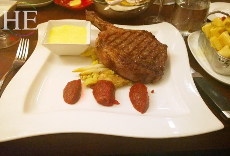 huge steak at SER restaurant in Dallas Texas on top of Hilton Anatole