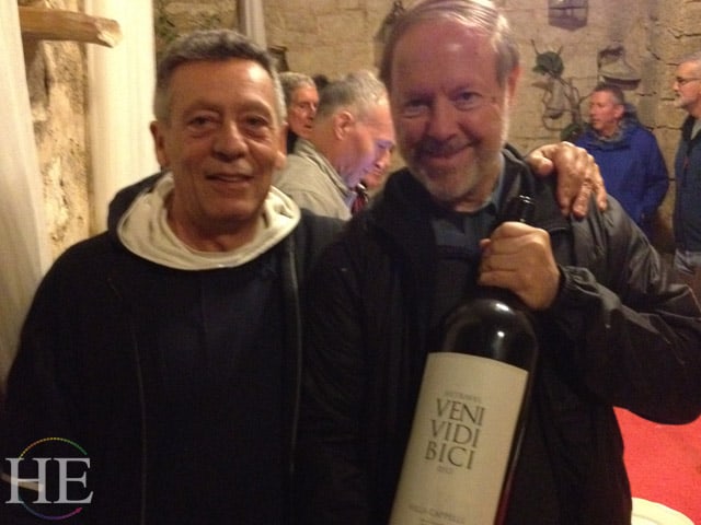 paul cappelli and phil sheldon with a signature wine on the HE Travel gay italy bike tour in puglia
