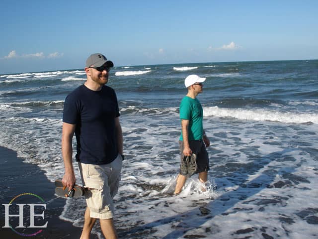 two guys on the beach on the HE Travel gay adventure in costa rica