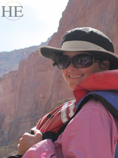 sara Moses wears a life jacket on the Grand Canyon motorized raft trip with HE Travel