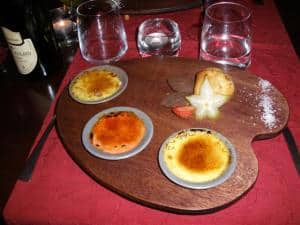 an assortment of creamy, crunchy desserts on the HE Travel gay France bike tour