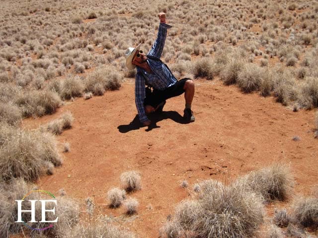 Zachary Moses in the fairy circle in Namibia - HE Travel