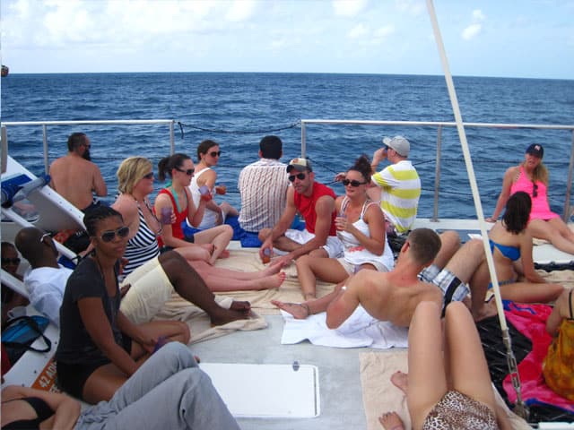 sunning on deck with HE Travel in Barbados