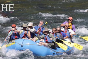 Whitewater rafting in Glacier Nationa Park, montana on an HE Travel gay adventure