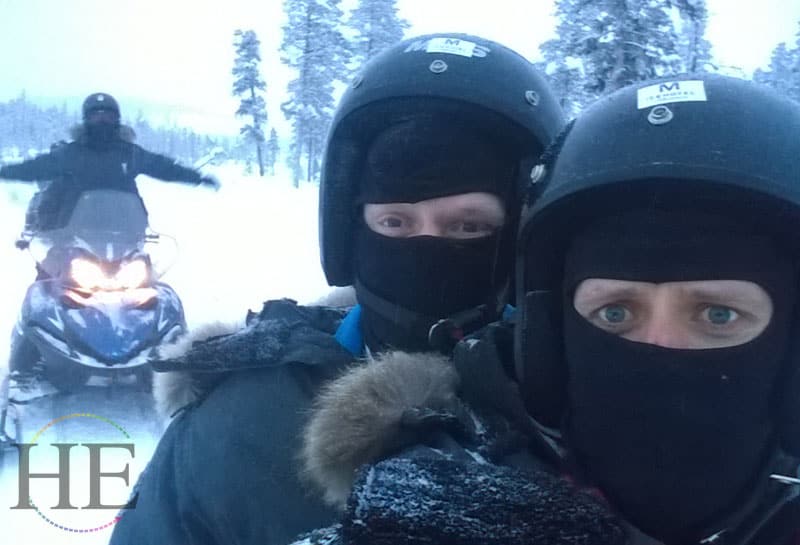 Chasing each other on snowmobiles in Sweden