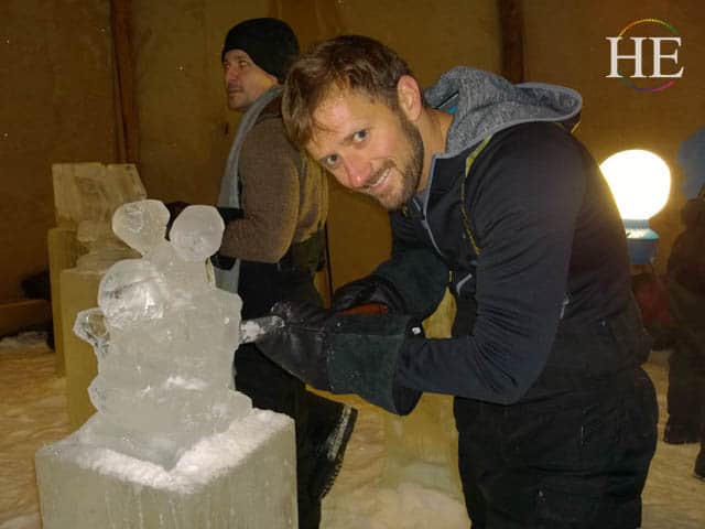 Zachary Moses makes an ice sculpture at the ice hotel in sweden