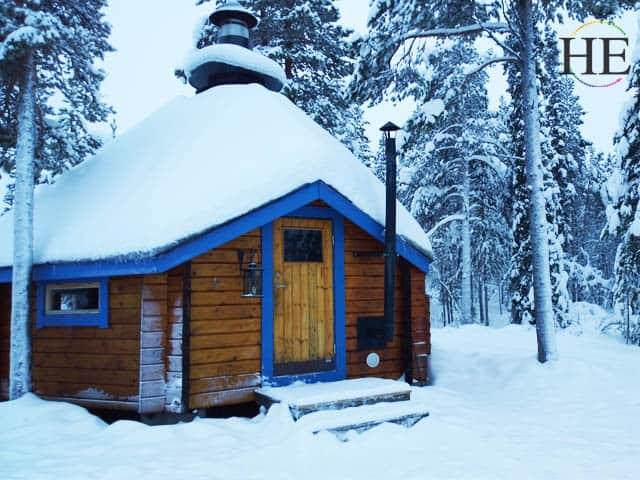a warm mountain hut for a rest after a day of snow mobile riding in sweden
