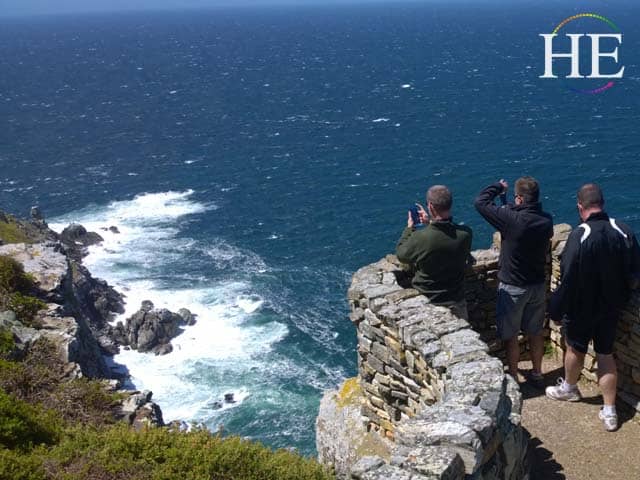 a gay group with HE Travel takes pictures of Cape Point in south Africa