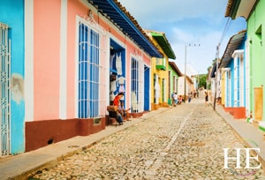 bright pastels houses in Trinidad on the gay Cuba trip with HE Travel