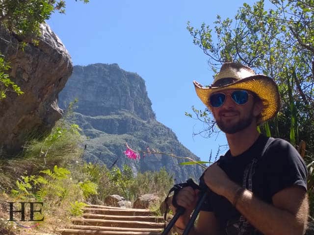 zachary moses poses while hiking in harold porter botanical garden in cape town south africa