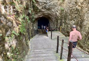 Entrance to a deep cavern where an HE Travel Gay Group tour can take a dip in the clear water