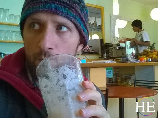 Zachary Moses enjoys a fresh made smoothie in a cafe in Cusco, Peru