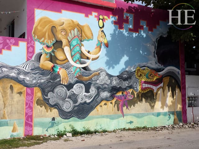 A colorful mural of an asian elephant in Mexico with HE Travel