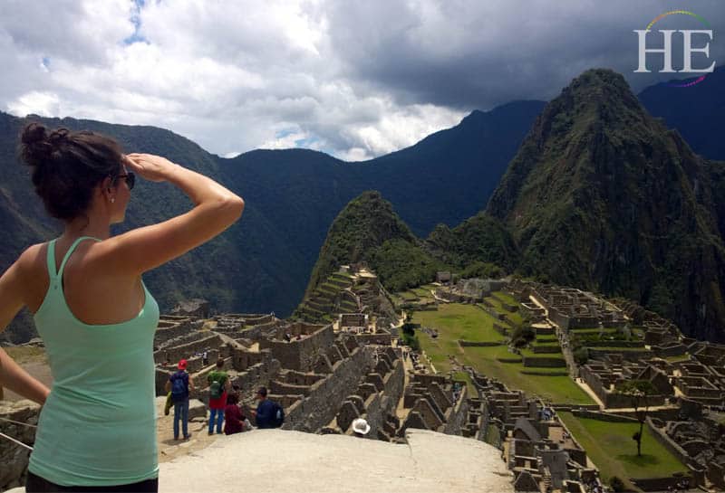 Iris Serbanescu stand looking over the ruins of Machu Picchu