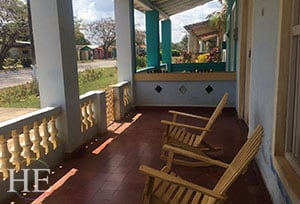 a beautiful and inviting front porch in cuba