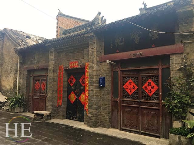 crumbling store fronts in the old city of luoyang china