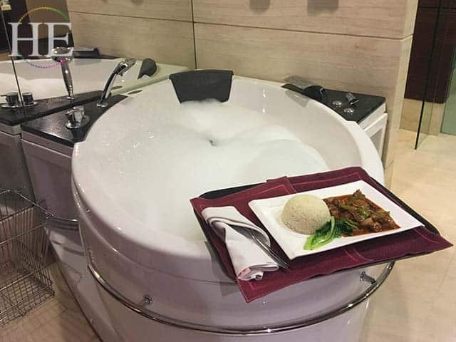 a bubbling jaccuzi tub with room service dinner in luoyang china