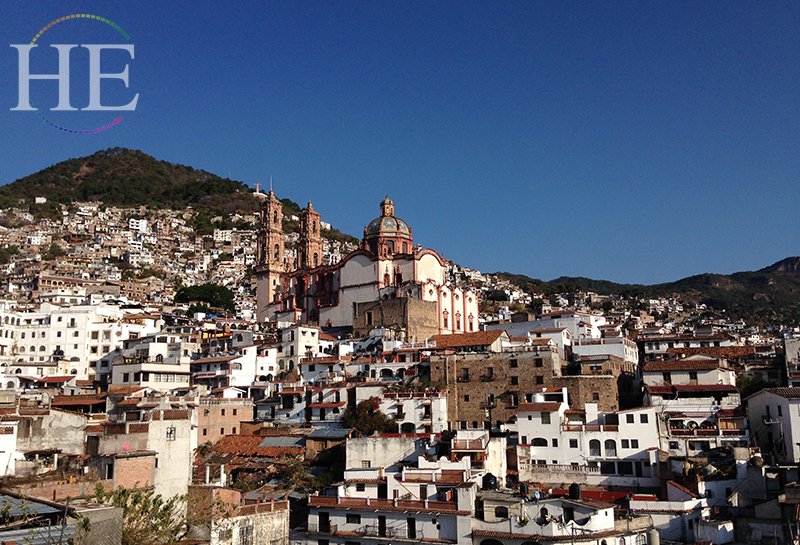 A view of the Taxco Cathedral and surrounding buildings on HE Travel's Mexico City/Puebla Cultural Tour.