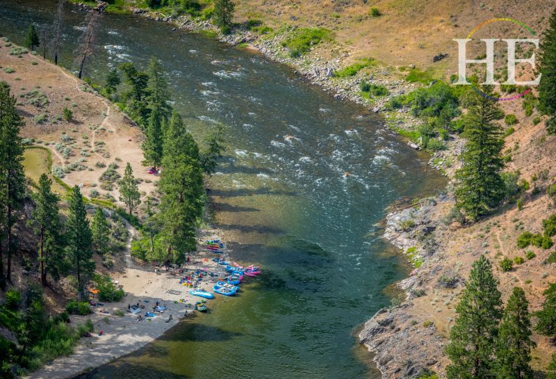 a view of the middle for of the salmon river featured on He Travel Gay Rafting Adventure