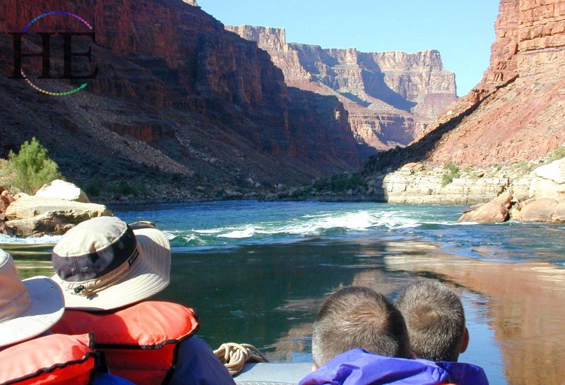 A gay group approaching some whitewater rapids on the splash grand canyon expedition down the Colorado river rafting adventure