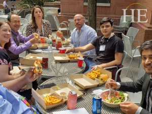 IGLTA Members eating impossible burgers in New York at MTHR Vegan