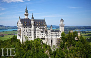 An aerial view of Neuschwanstein Castle and the surrounding woods on HE Travel's Germany Cultural Tour.