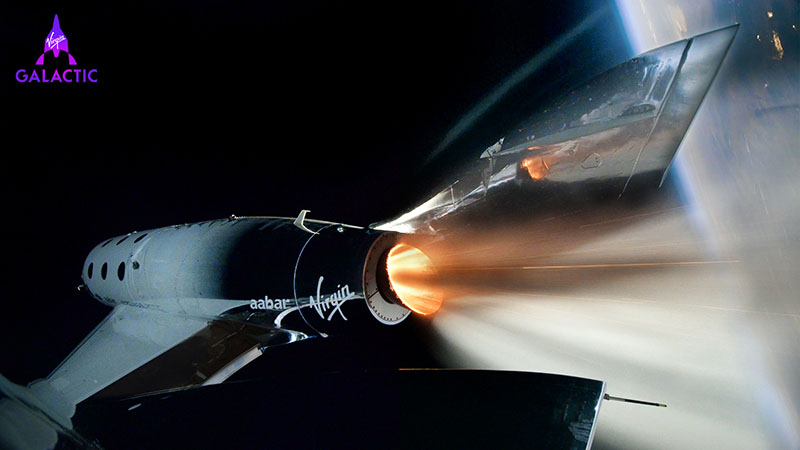 Rocket shooting flames cruising above earth